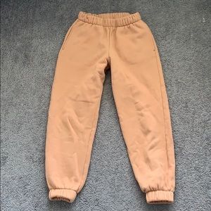 peachy/salmon sweatpants